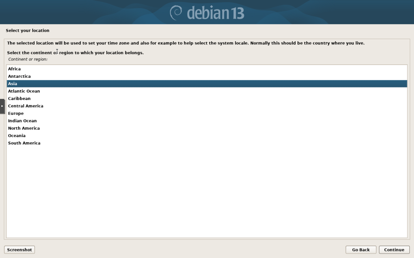Debian grafik kurulumunun Continent or region listesinde Asia satırı seçili.